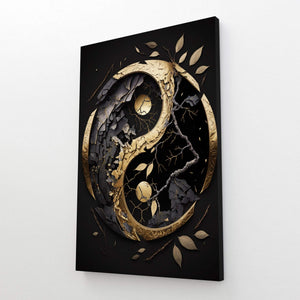 Decorative wall art with a gold and black yin yang symbol on a white background